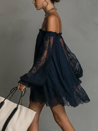 Betty • Navy blue mini chiffon dress with off-shoulder neckline, lace trim, and sheer sleeves